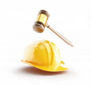 construction helmet, wood gavel, law